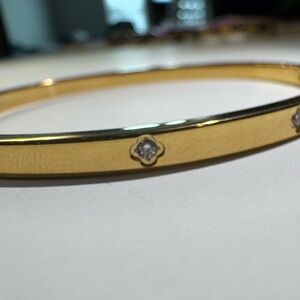Elegant Gold Bangle with Diamond Accents